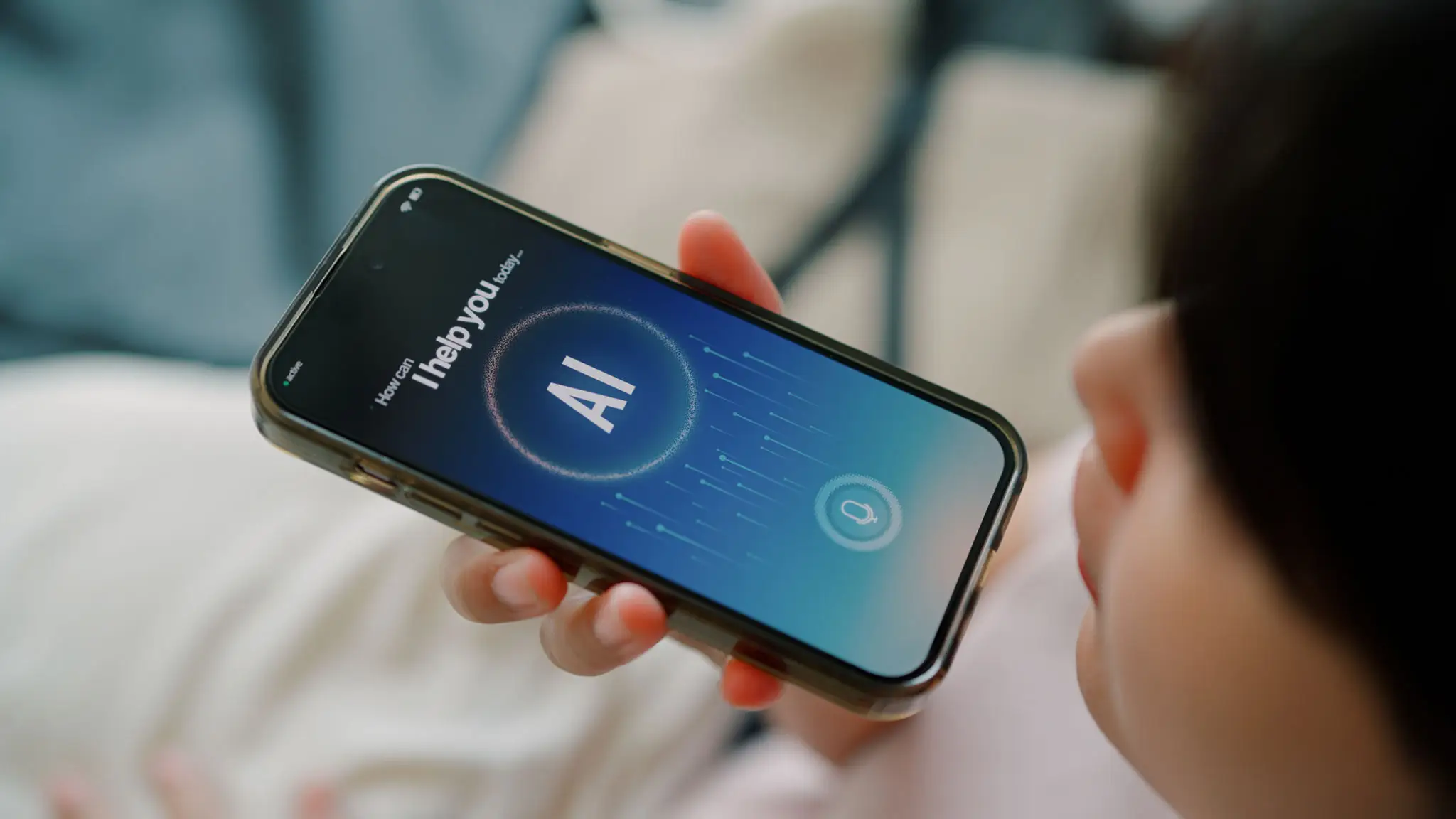 Woman talking to AI agent on cell phone