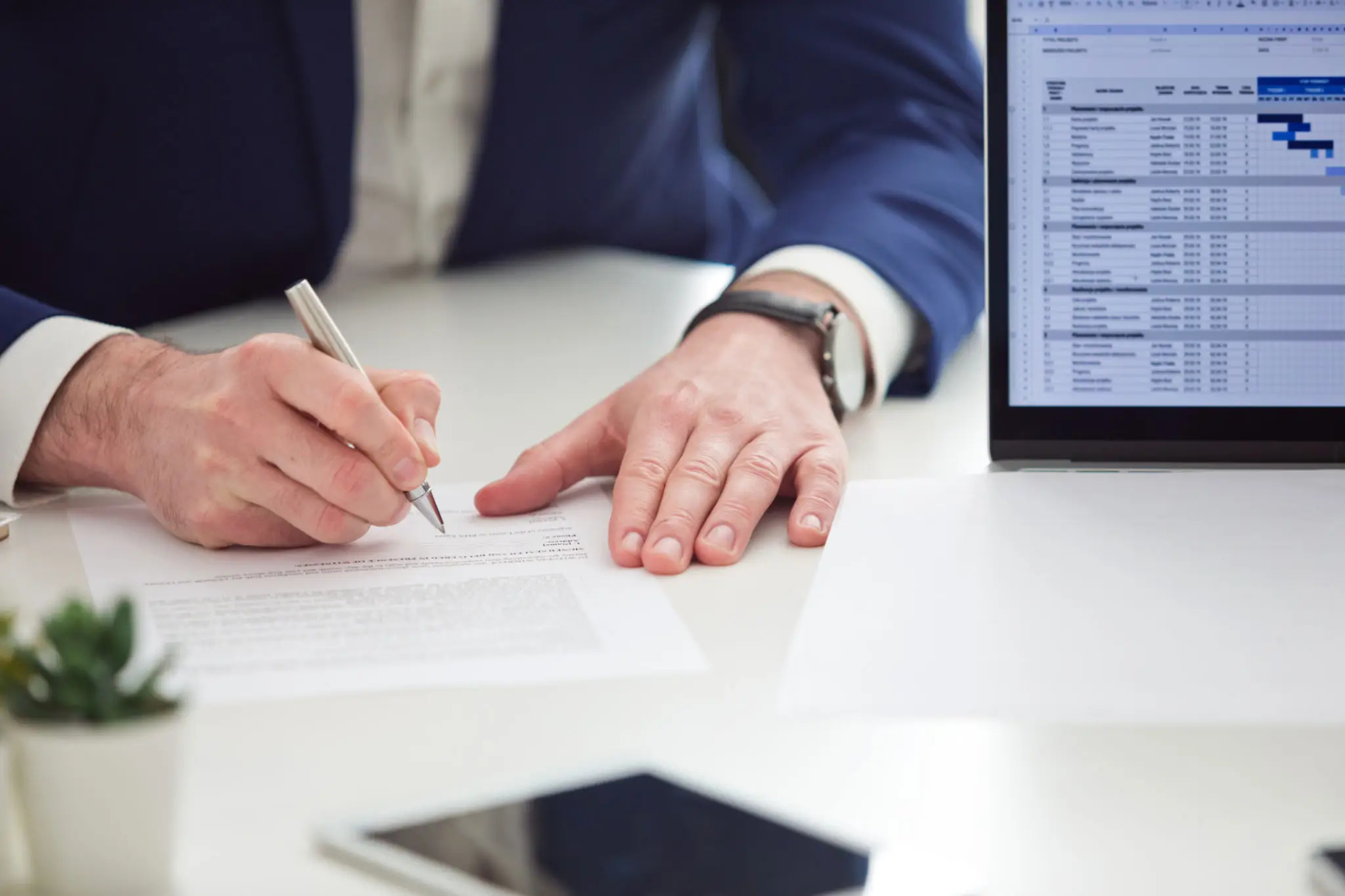 Credit officer reviewing AI-assisted credit memo draft