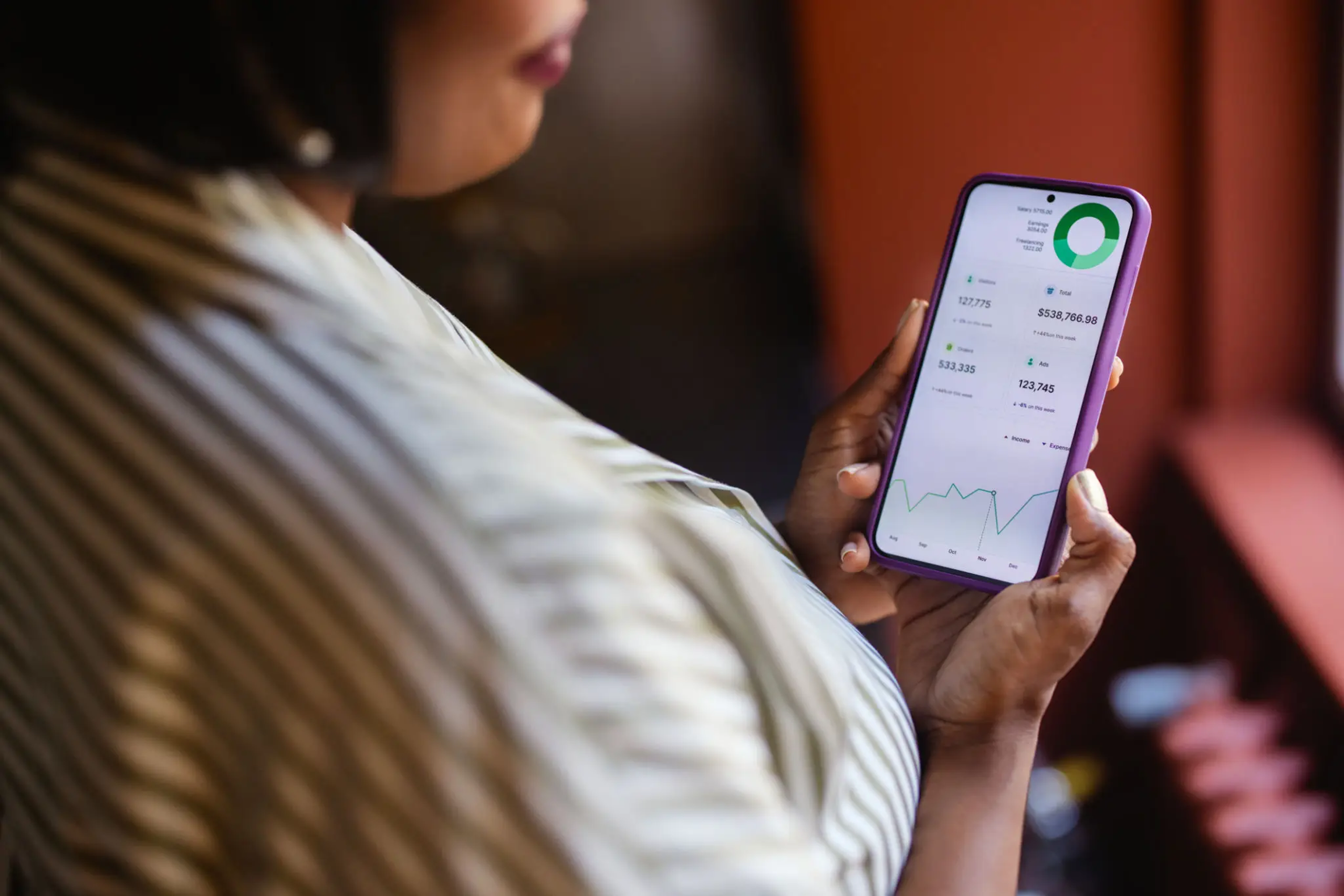 Customer reviewing financial information on a mobile device