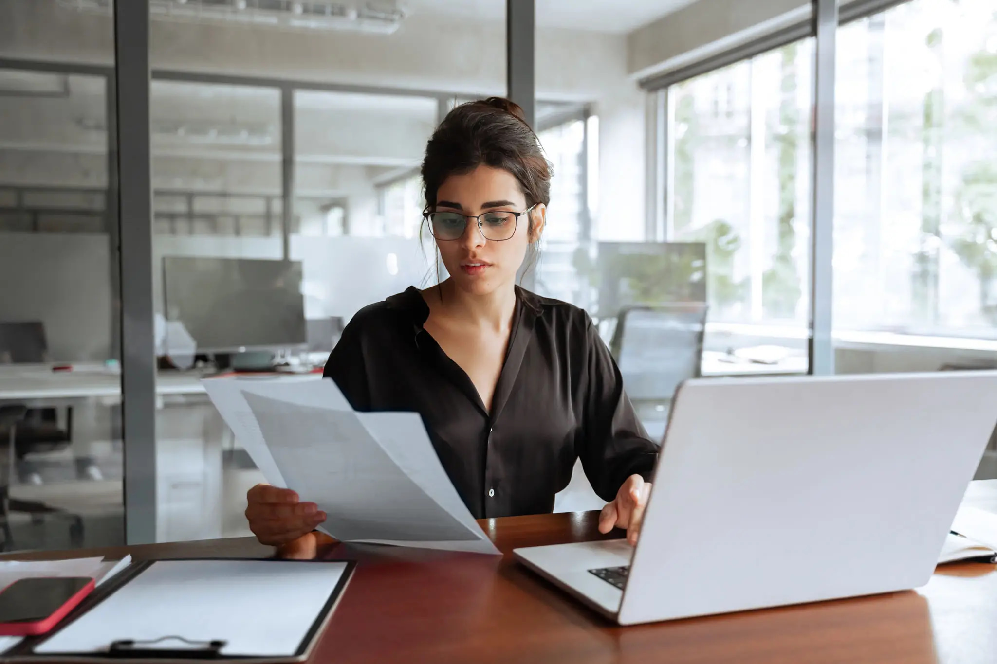 Compliance officer reviewing suspicious activity monitoring controls