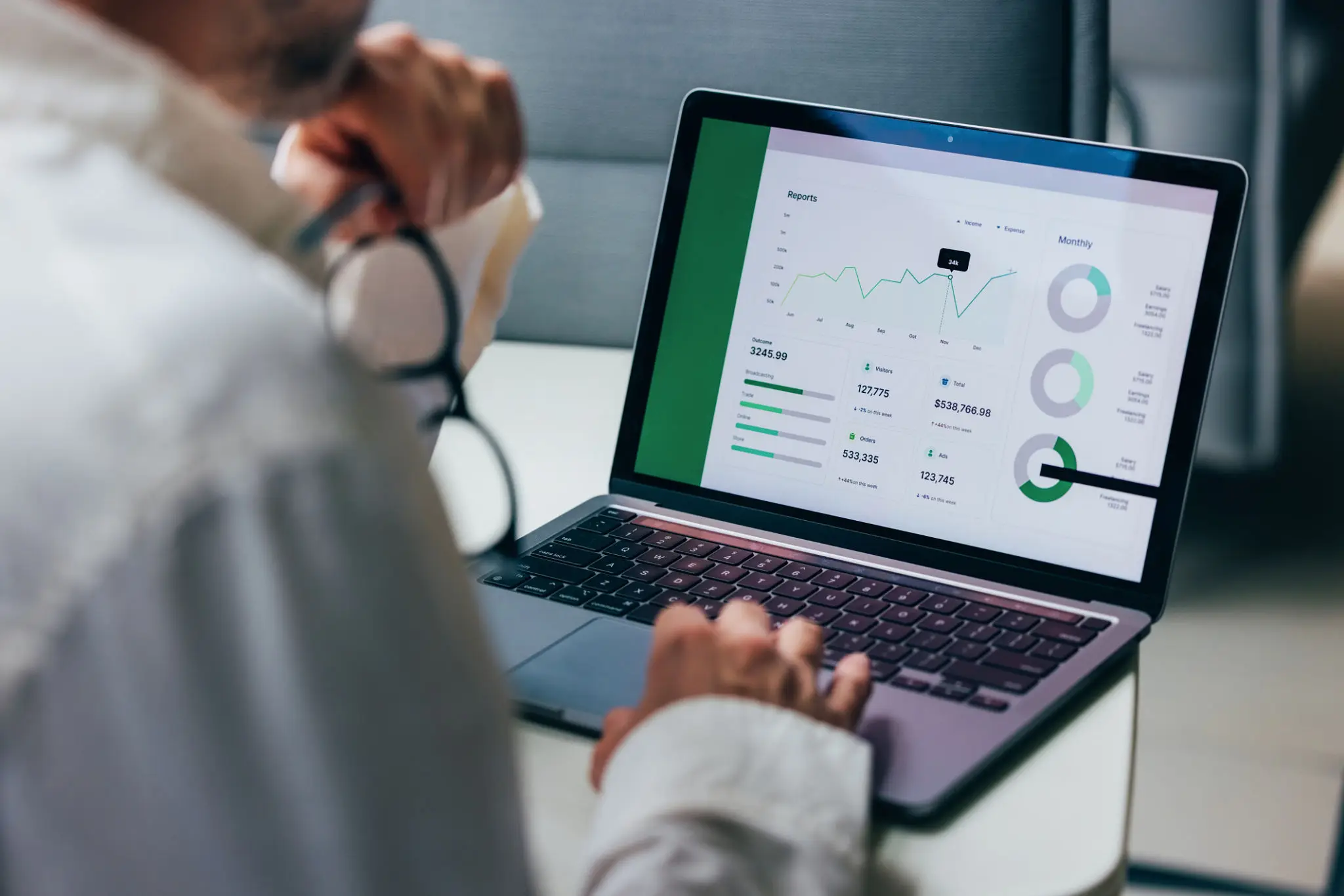 Bank executive and technology lead reviewing modernization KPIs